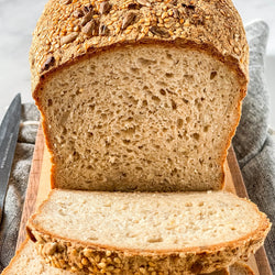 Whole Grain Seeded Loaf | VEGAN | half loaf, sliced