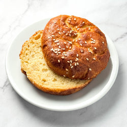 Hamburger roll on white plate
