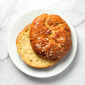 hamburger roll on white plate
